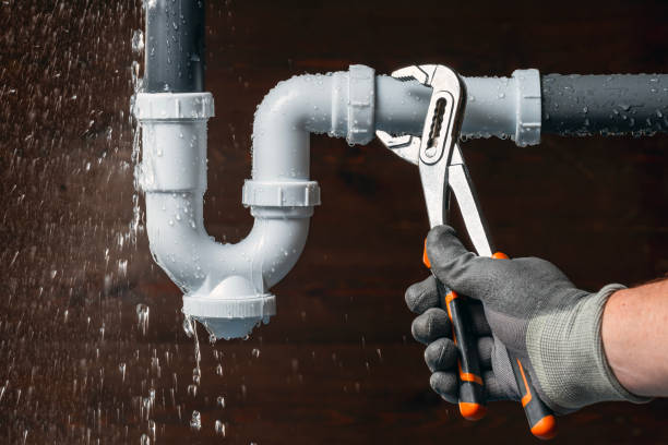 Professional Drain Cleaning technician working in Newtonville, MA